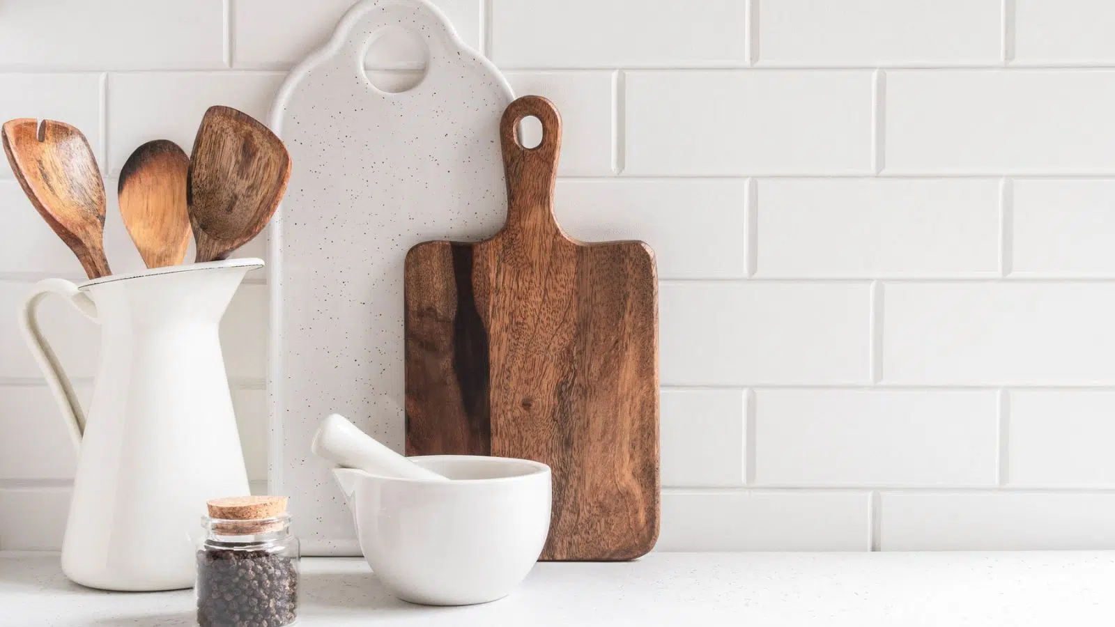 kitchen countertop with cutting board and muddler