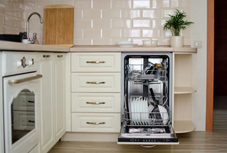 open dishwasher with clean dishes in kitchen overall plan.