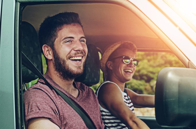 Friends, road trip and happy in car for travel, together and journey with explore, adventure and vacation. People, smile and excited in van or suv with transport for summer, crazy drive and freedom