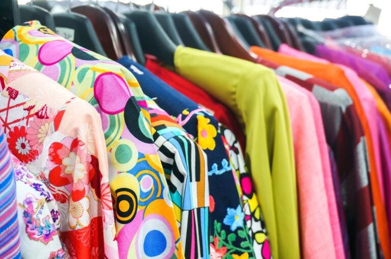 thrifted clothes on rack