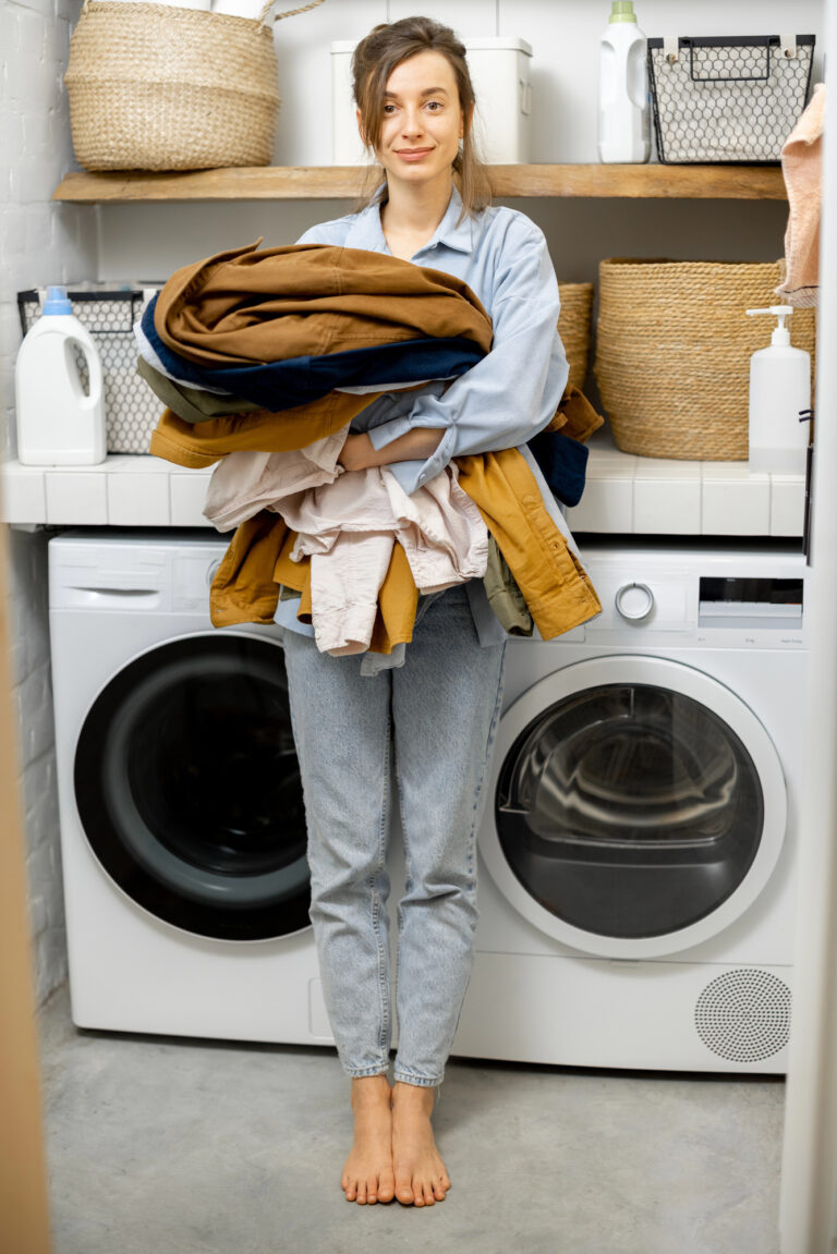 woman holding clothes