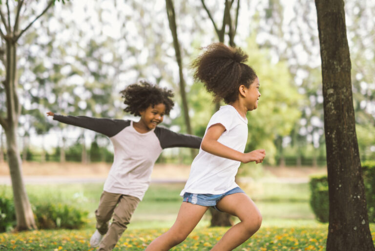 little girl playing outdoor - child kids and friend happy.