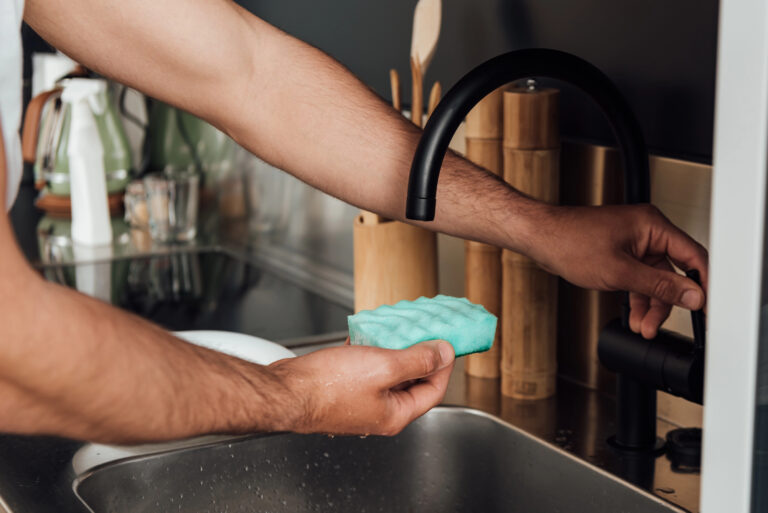 man holding sponge