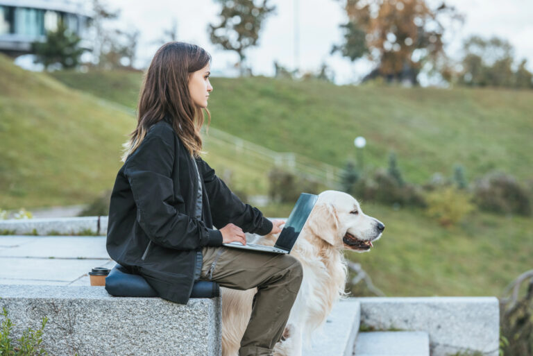 woman stroking dog