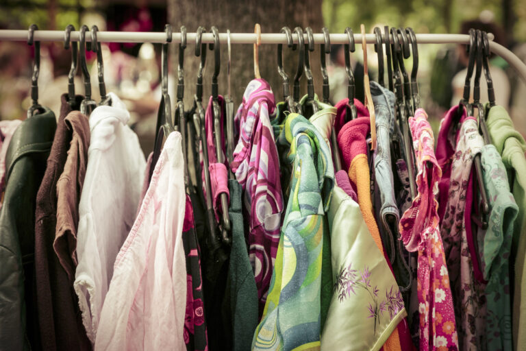 thrift clothes on rack