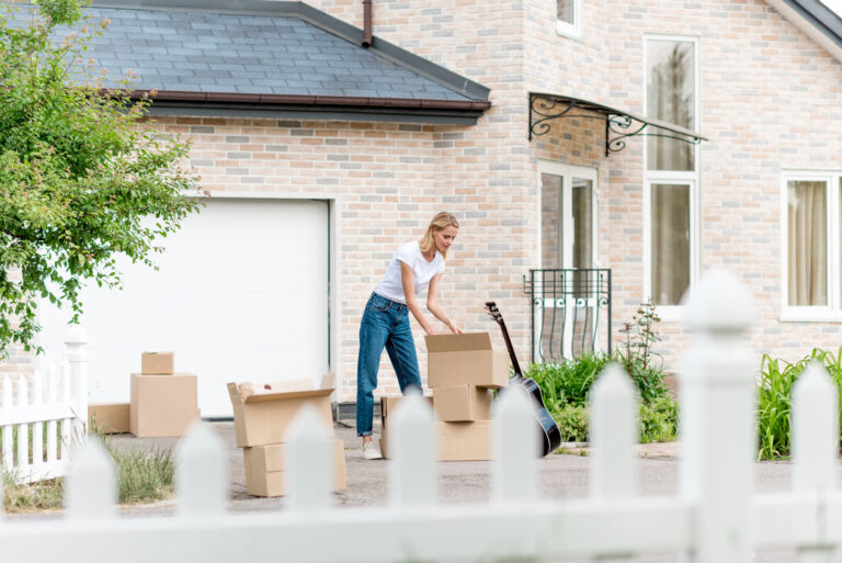 woman outside house