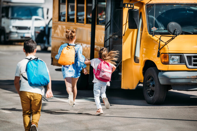 kids running to the bus