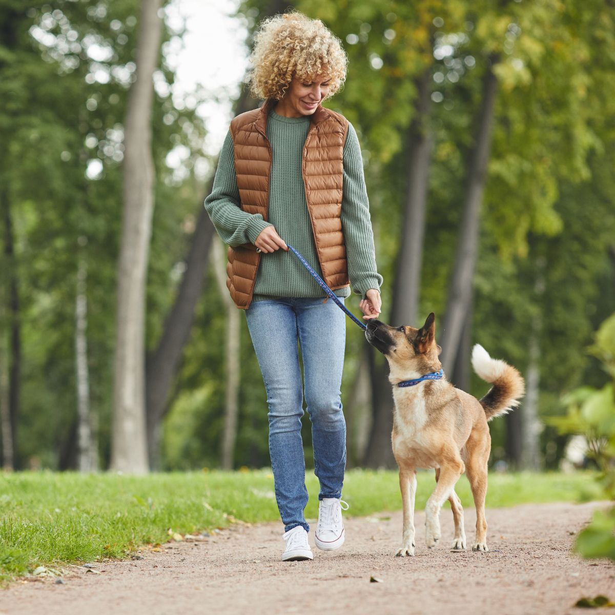 woman walking dog 1